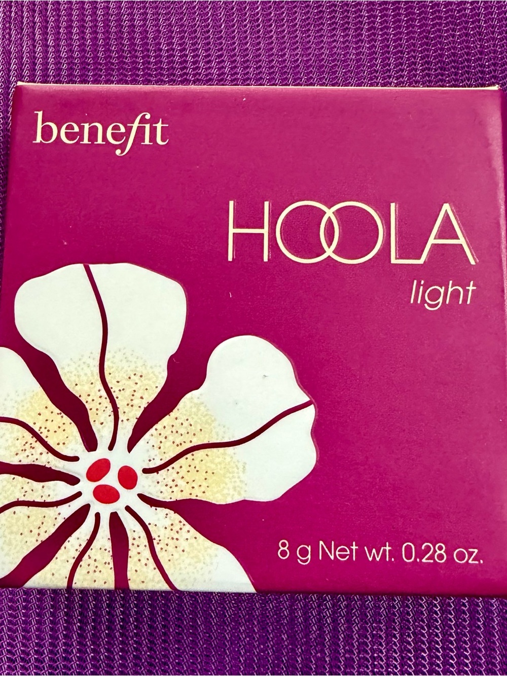 benefit HOOLA Powder Light Bronzer in Ultra Fine.